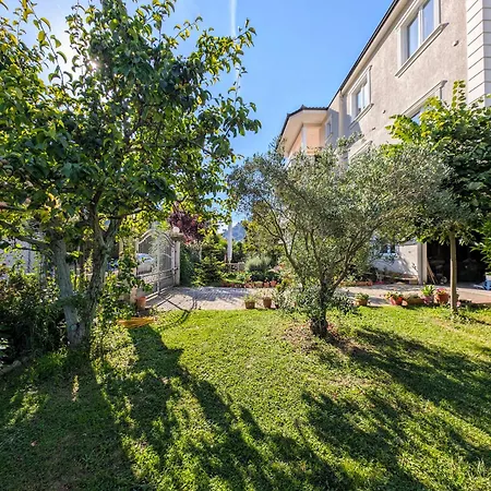 With Garden And Veranda *