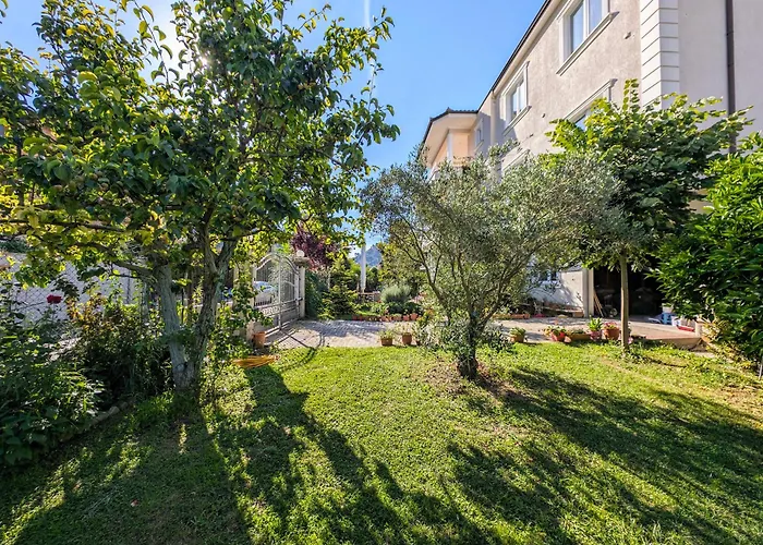 With Garden And Veranda *