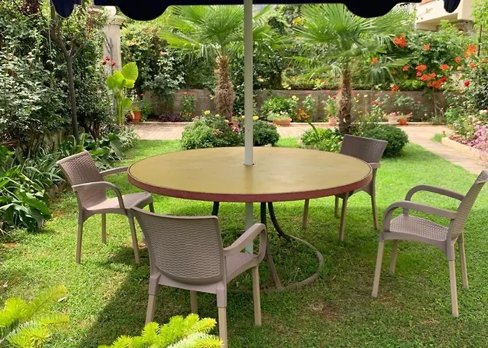 With Garden And Veranda *